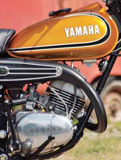 Both engine side covers were flat-filed to remove deep gouges, then finished with progressively finer grades of sandpaper before being buffed with a polishing wheel.